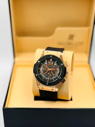 My mens rose gold chronograph watch with black rubber strap