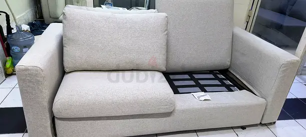 Light grey 2-seater sofa (one cushion missing) - good condition