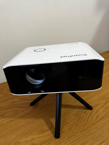 XuanPad - AI Auto Focus Keystone 26000L Native 1080P Smart Portable Projector 4K - Like New!!