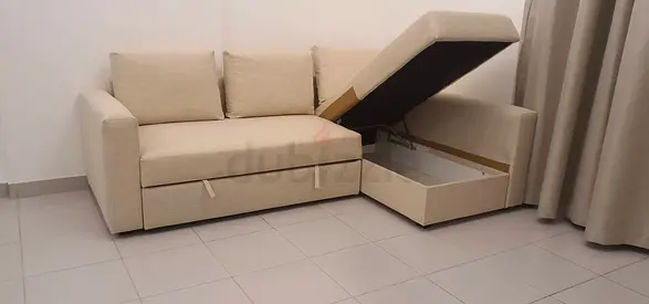 Beige L-shaped Storage Sofa with Pull-out Bed - Good Condition