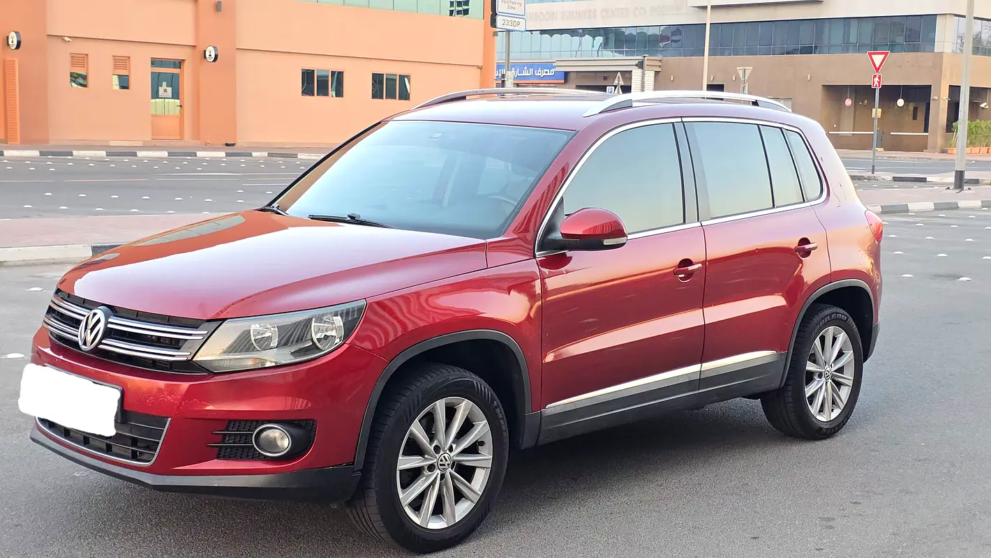 Volkswagen Tiguan 2014 — photo 1 of 19