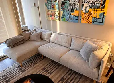 Perfect condition crate and barrel feather filled lshape sofa