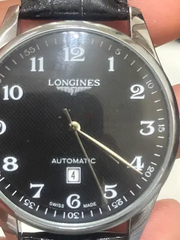 Longines automatic mens wristwatch with black dial and leather strap