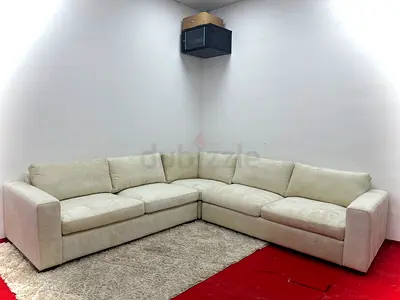 Beige color pottery barn corner sofa