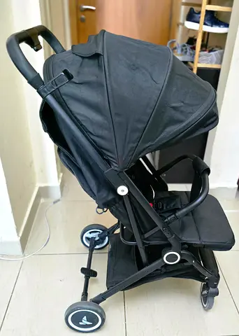 Compact black lightweight stroller in good used condition
