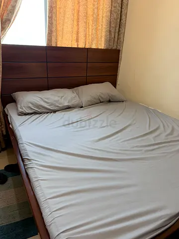 Queen wooden bed frame with headboard - good condition