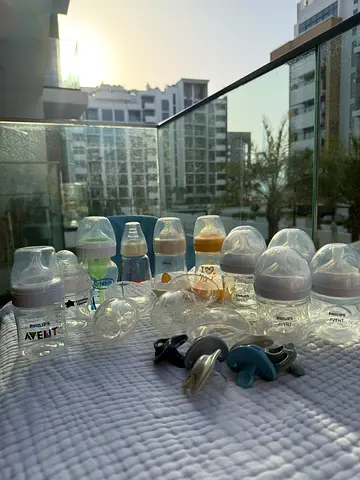 Assorted Baby Bottles, Breastfeeding Items, Nipples and Pacifiers