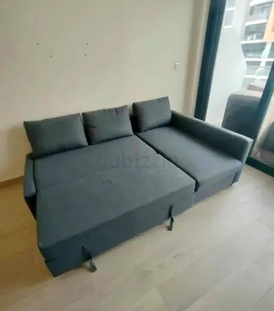 Ikea L shape sofa store cum bed and you can fix the storage lift or right