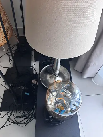 Pair of modern bedside lamps with exposed filament bulbs