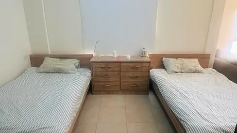 Pair of wooden single and a half beds with 2 new mattress and matching 6-drawer dresser