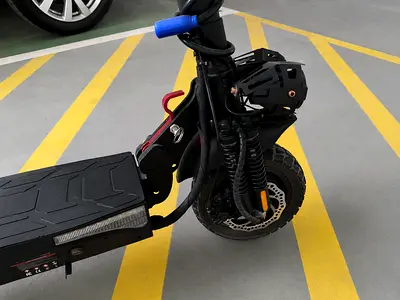 Used electric scooter with dual suspension and disc brakes - good condition
