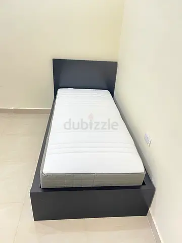 Ikea single bed with mattress 90cm x 200cm. In an excellent condition. Pick up from khalifa city
