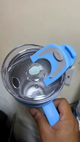 Reusable insulated water bottle with straw and lid - light blue