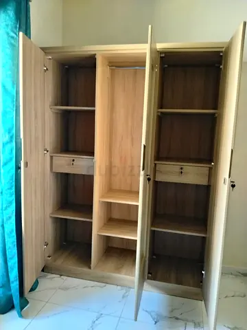 Three-Door Wooden Wardrobe with Shelves and Drawers - Good Condition