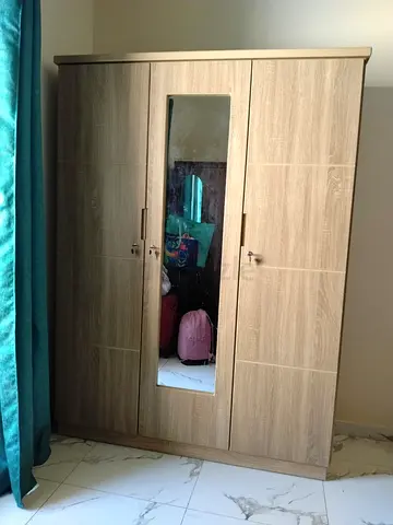 Three-Door Wooden Wardrobe with Shelves and Drawers - Good Condition