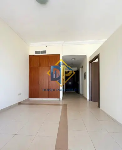 Convertible Studio for Rent in Warsan 4 | Semi-Closed Kitchen | 700+ Sq. Ft.