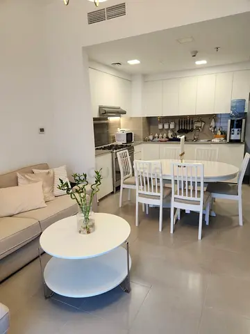 White Round Dining Table with 6 Chairs and Matching Coffee Table - Great Condition