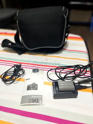 Nikon D90 with Two lenses (18-105  70-300mm)Accessories Kit with Charger, Battery and Carry Bag