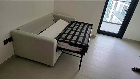 Light grey 2-seater sofa bed - good condition