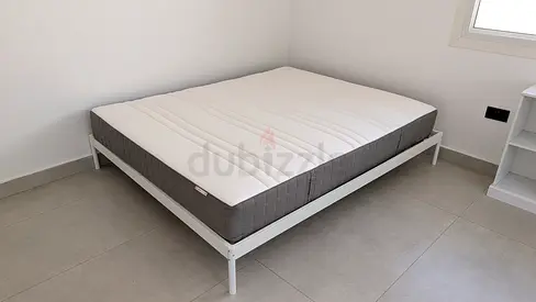 Queen size mattress with simple metal bed frame - good condition