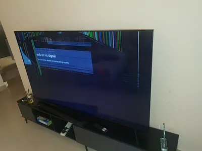 70 inch Smart TV with cracked screen - for parts or repair