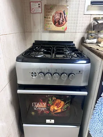 Used 4-Burner Gas Stove with Oven - Good Working Condition