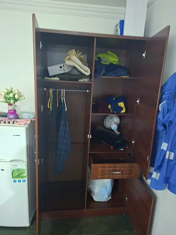 Dark wood 3-door wardrobe with drawers — good condition