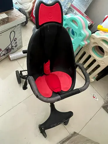 Used baby rocker/rocking chair with harness - black  red
