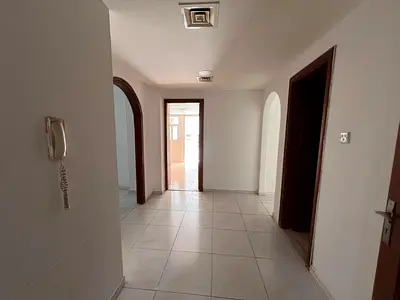 Two bedroom apartment with a living room balcony and open view for annual rent in Sharjah Al Butina area