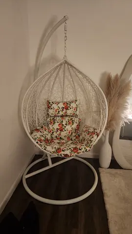 White Wicker Hanging Egg Chair with Floral Cushions