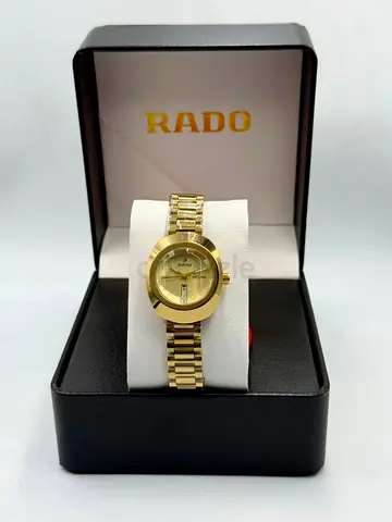 Gold-tone Rado womens wristwatch with original box