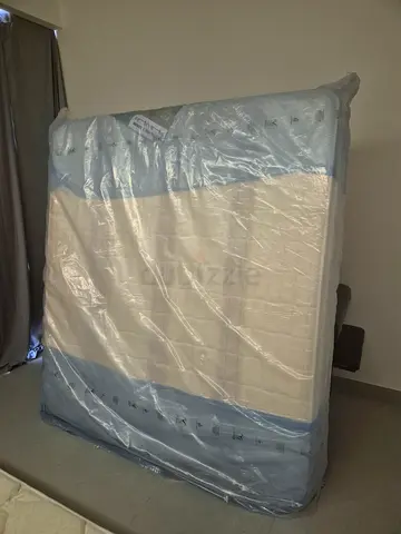 King-size mattress (1 year use - wrapped) - Good condition