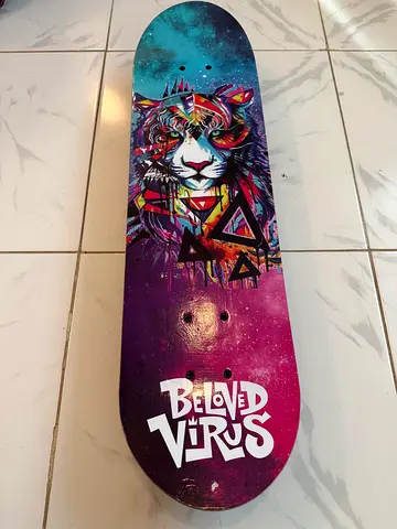 Beloved Virus skateboard with lion graphic