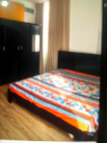 Queen bed frame with mattress and matching wardrobe - good condition
