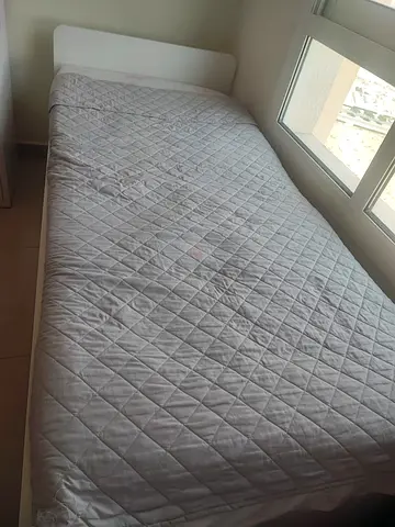 Single bed frame IKEA with mattress and quilted cover - good condition free bedding