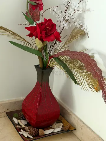 Red decorative vase (flowers not included)