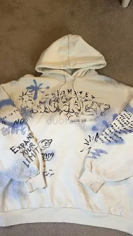 White Graphic Hoodie with Blue Spray-Paint Design, Size Approx M-L