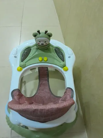 Baby Walker with soft seat and toy panel - Good condition
