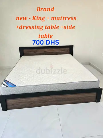 Super King bed frame, king mattress with matching bedside table and vanity.  Very good condition,