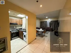 Elegant furnished 2BR with all appliances, large hall, balcony with open view, free maintenance, liv