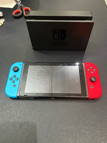 Nintendo Switch console (Neon Joy-Cons) with dock - used