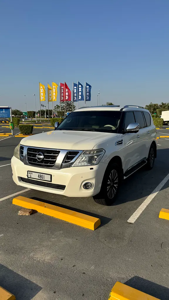 Nissan Patrol 2014 — photo 1 of 9