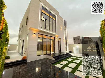 فيلا ممتازة بتصميم عصري وموقع مميز في منطقة الزاهية بعجمان 4 غرف نوم ماستر غرفة خادمة مجلس أنيق صالتان عائليتان بتصميم مريح
