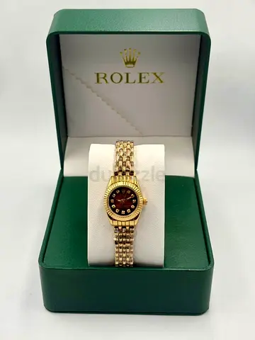 Rolex ladies gold wristwatch with diamond markers in original box