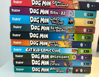 Bundle of 10 Dog Man  Cat Kid graphic novels by Dav Pilkey -All hardcover
