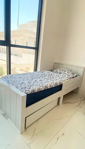 Single white wooden bed frame with under-bed drawer. Sofas , others