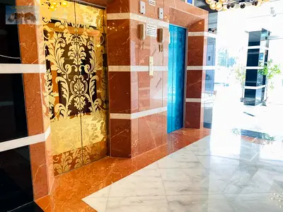 Three-bedroom apartment with a living room available for annual rent in Al Rawda 2 in a prime and strategic location directly opposite Kenz Mall and