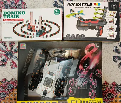 Bundle: Domino Train, Air Battle Launcher  RC Stunt Car - Good Condition
