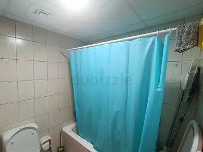 Light blue fabric shower curtain - good used condition