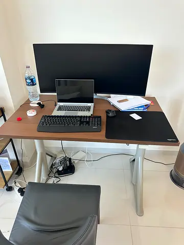 Sit-stand desk from Ikea (2.3k AED retail, 120 x 70)